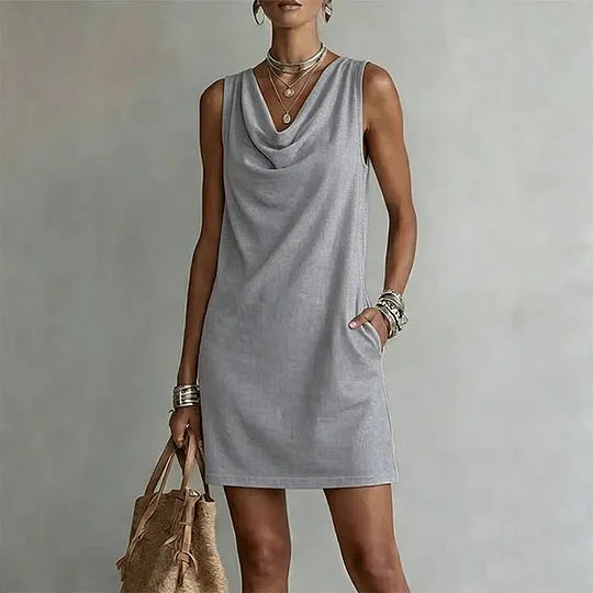 📢⏰ Vestido elegante e justo com decote drapeado – sem mangas, com bolsos laterais, versátil ✨