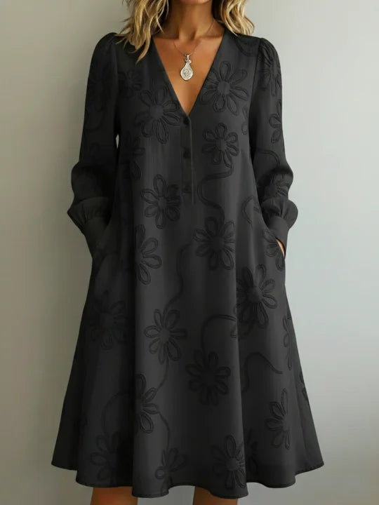 Vestido vintage elegante com decote em V e bordados florais