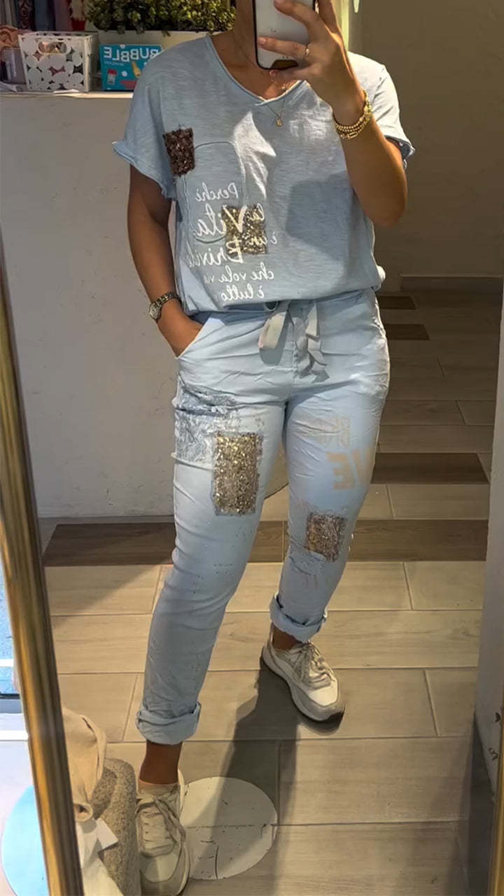 Conjunto casual de blusa e calças para menina com decote em V e estampado dourado