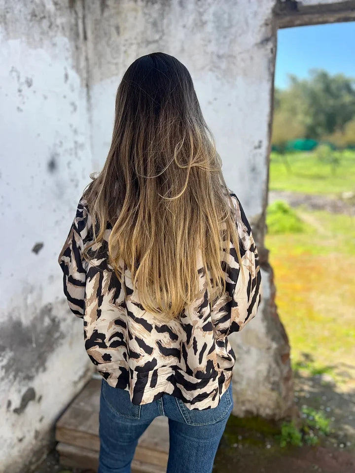 Casaco de mulher com fecho e estampa de zebra para outono