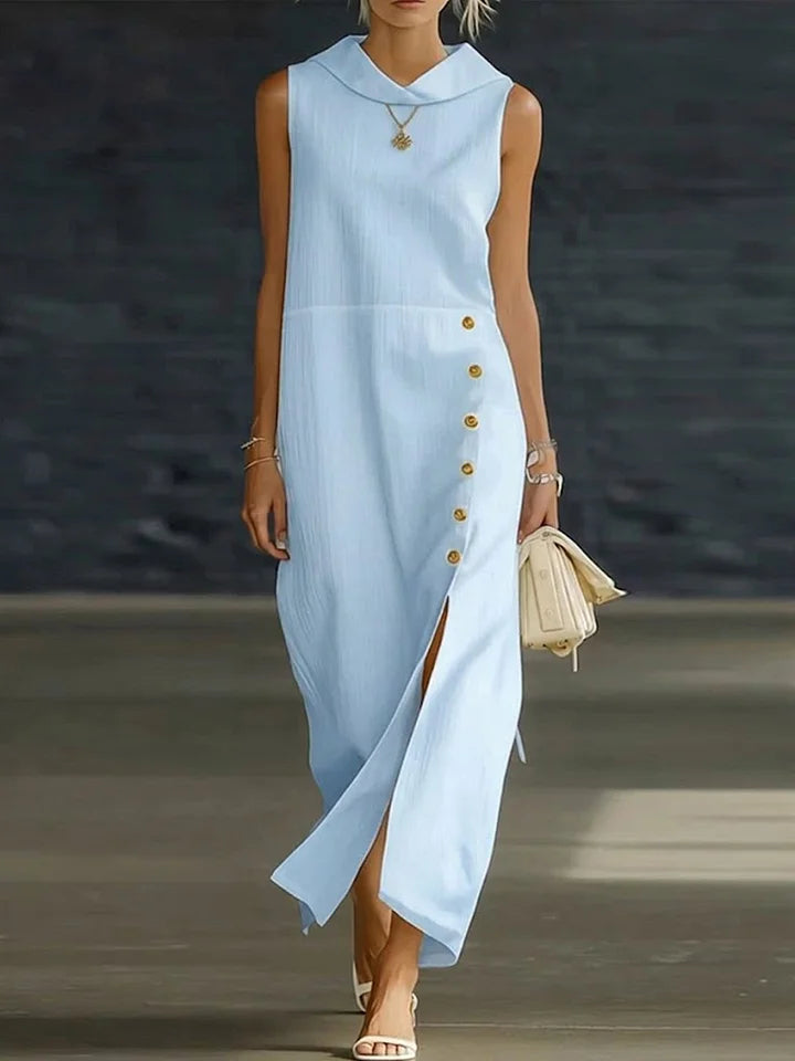 Vestido casual largo, sem gola e sem mangas, confecionado em algodão e linho.
