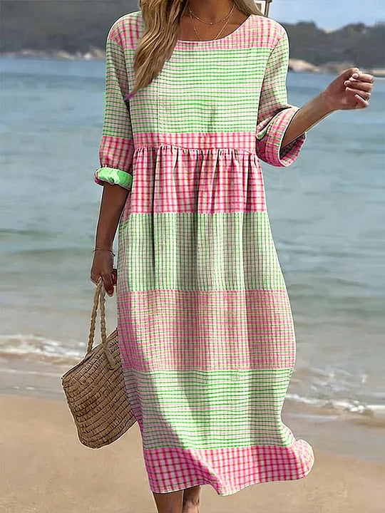 Vestido casual de mulher em algodão e linho com estampado, gola redonda e mangas médias.