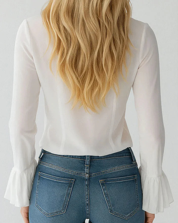 Blusa de menina com folhos e mangas sino