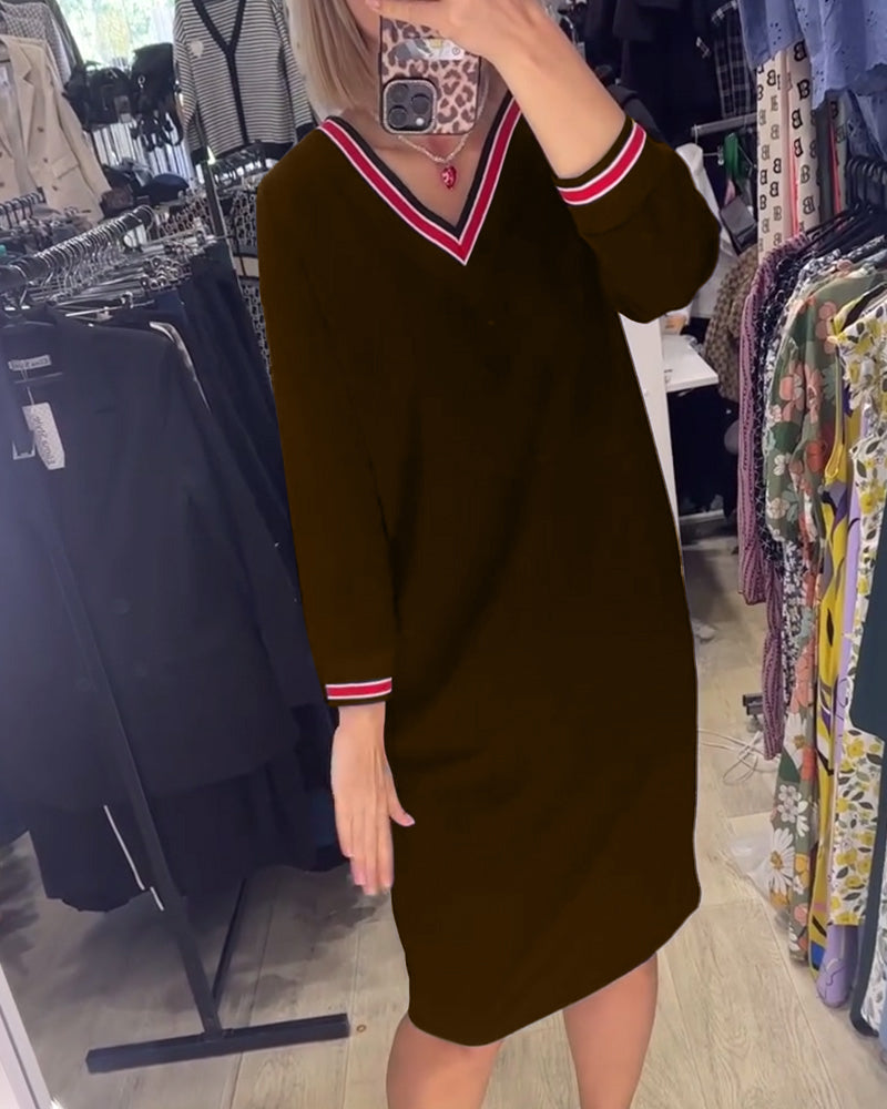 Vestido elegante com decote em V e bolsos