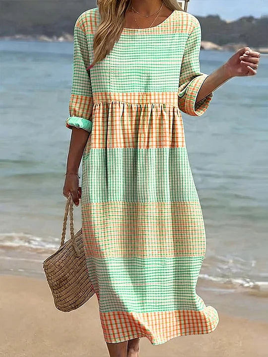 Vestido casual de mulher em algodão e linho com estampado, gola redonda e mangas médias.