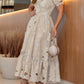 Vestido elegante com bordado floral vazado