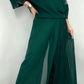 Conjunto de blusa com decote redondo e painéis em tela + calças pantalonas plissadas