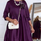 Vestido solto com estampado floral tridimensional e gola redonda