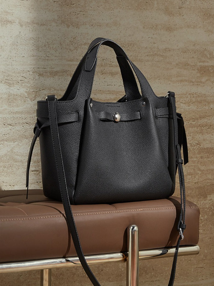 Bolsa em pele genuína com fecho de pressão