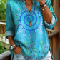Camisa casual de mulher em algodão denim lavado com estampado floral de girassóis e decote em V.