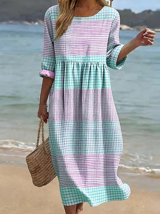 Vestido casual de mulher em algodão e linho com estampado, gola redonda e mangas médias.