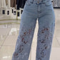 Calça de ganga feminina com patchwork e renda vazada