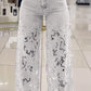 Calça de ganga feminina com patchwork e renda vazada