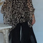 Conjunto casual para menina com blusa e calças estampadas e decote redondo