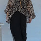 Conjunto casual para menina com blusa e calças estampadas e decote redondo