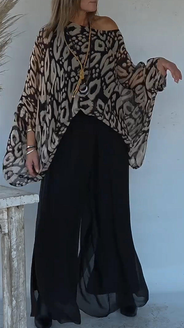 Conjunto casual para menina com blusa e calças estampadas e decote redondo