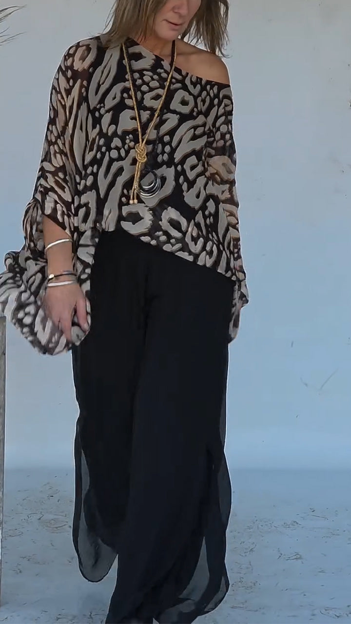 Conjunto casual para menina com blusa e calças estampadas e decote redondo
