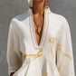 Elegante minivestido de renda com decote em V