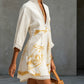Elegante minivestido de renda com decote em V