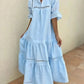 Vestido comprido de senhora em algodão e linho com estampado vazado e cores sólidas.