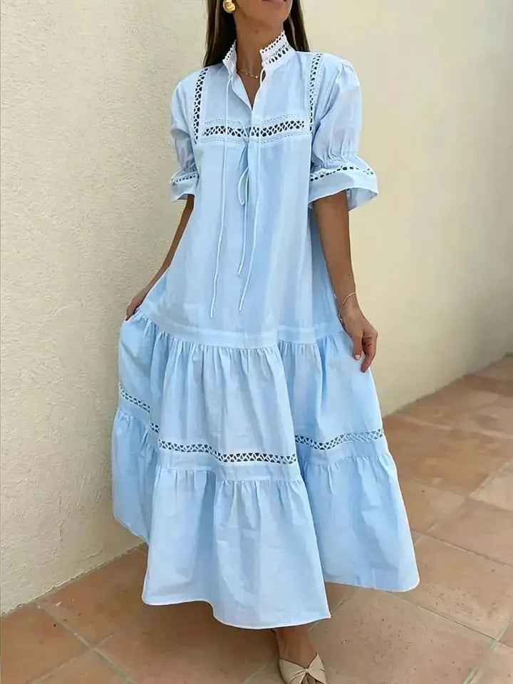 Vestido comprido de senhora em algodão e linho com estampado vazado e cores sólidas.