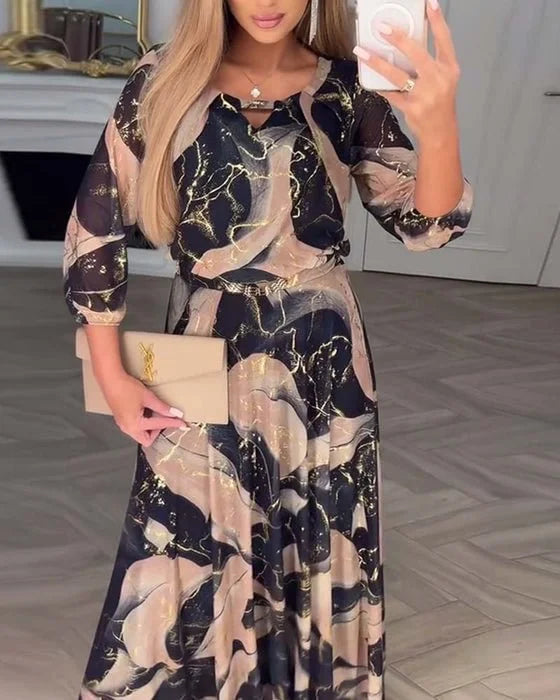 Vestido elegante em chiffon com estampado e mangas a três quartos