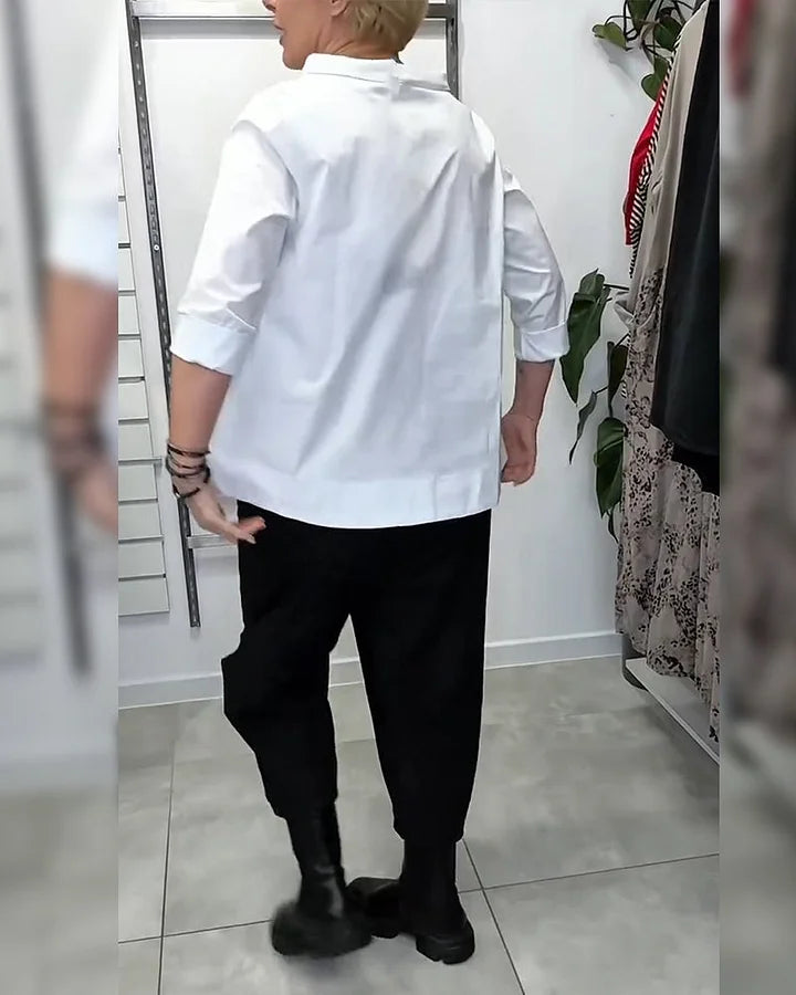 Blusa com gola larga, 100% algodão, cor lisa, estilo casual.