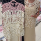 Camisola de manga curta com gola redonda e detalhes vazados + saiote