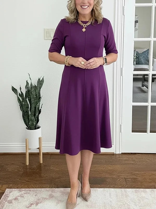 Vestido midi liso com mangas 3/4 e decote redondo