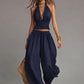 Conjunto sexy boho de duas peças com top de alças e calças pantalona.