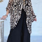 Conjunto casual para menina com blusa e calças estampadas e decote redondo