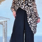 Conjunto casual para menina com blusa e calças estampadas e decote redondo