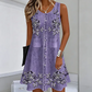 Vestido sem mangas – com um estampado e um look que imita jeans.