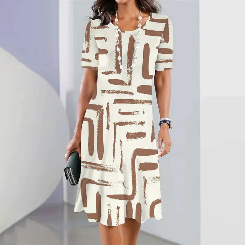 Novo vestido elegante com estampado em contraste e decote redondo.