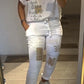 Conjunto casual de blusa e calças para menina com decote em V e estampado dourado