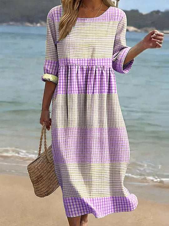 Vestido casual de mulher em algodão e linho com estampado, gola redonda e mangas médias.