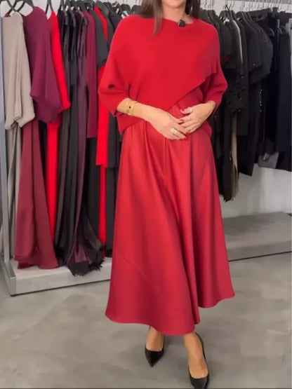 Conjunto de duas peças para mulher: camisola de malha e vestido de cetim.