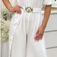 Macacão feminino elegante e moderno com folhos e fenda de um ombro só
