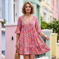 Vestido de menina com decote em V, punhos franzidos e estampado floral
