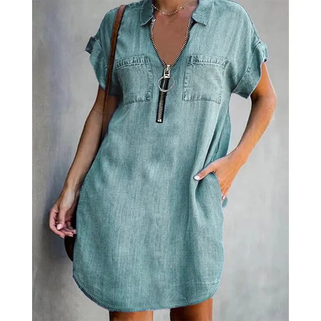 Vestido-camisa de ganga para menina de corte solto – vestido com gola, bolsos e fecho de correr.