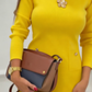 Vestido elegante de mangas compridas com gola redonda