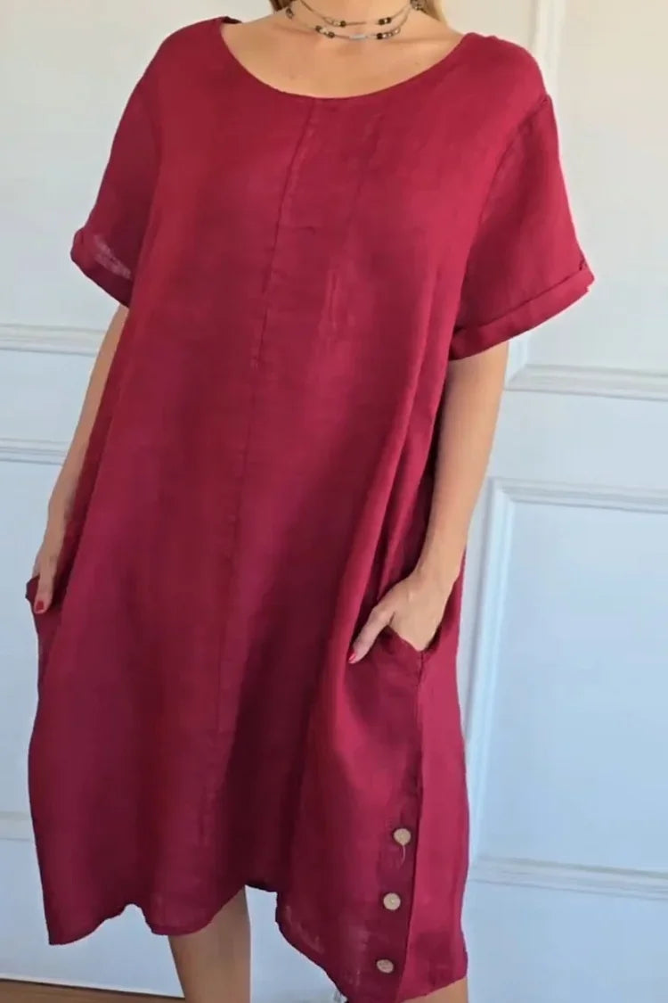 Vestido de linho de manga curta e gola redonda, modelo 2026