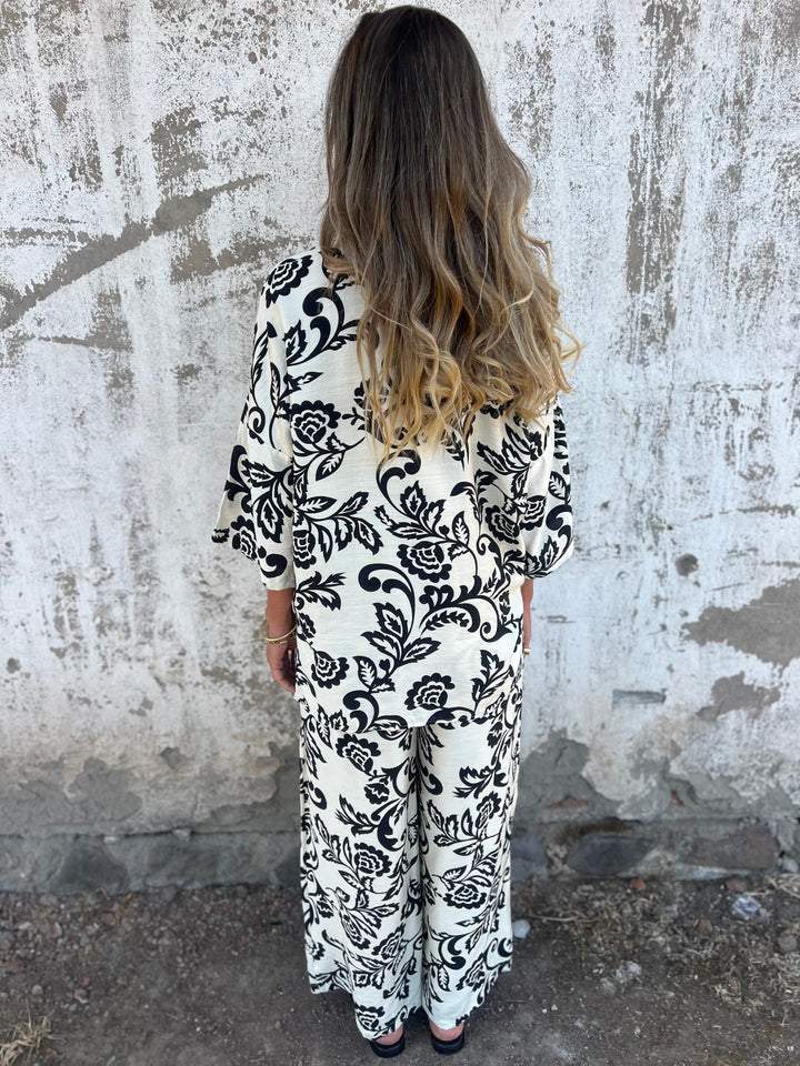 Camisa estampada para mulher com botões e calças largas (conjunto de 2)