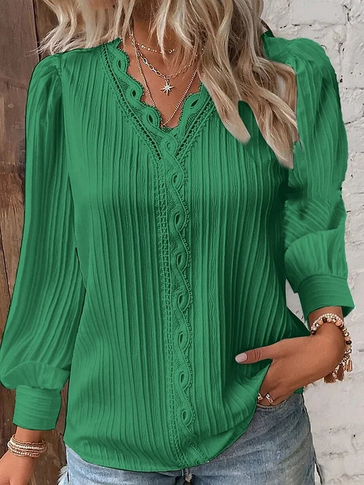 Camisa de senhora em renda, elegante e moderna, de cor sólida