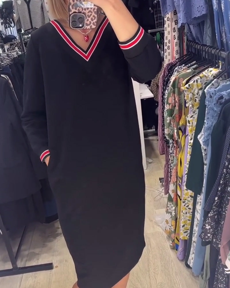 Vestido elegante com decote em V e bolsos