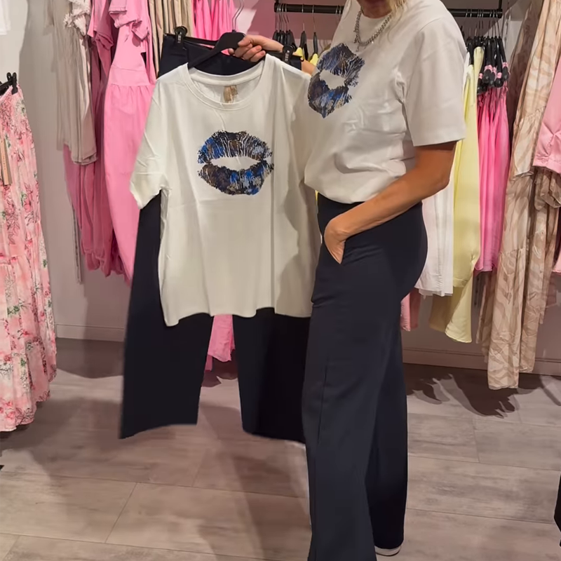Conjunto de duas peças para menina com estampado, blusa e calça