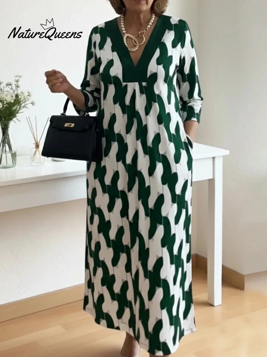 Um elegante vestido midi adornado com estampados artísticos e decote em V