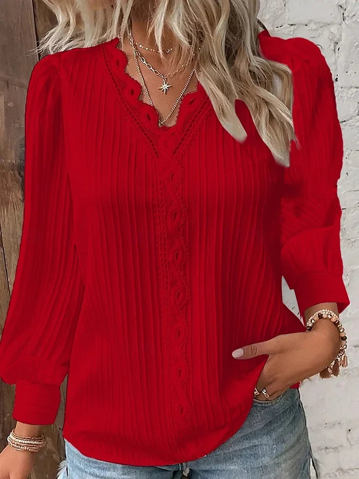 Camisa de senhora em renda, elegante e moderna, de cor sólida