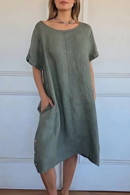 Vestido de linho de manga curta e gola redonda, modelo 2026
