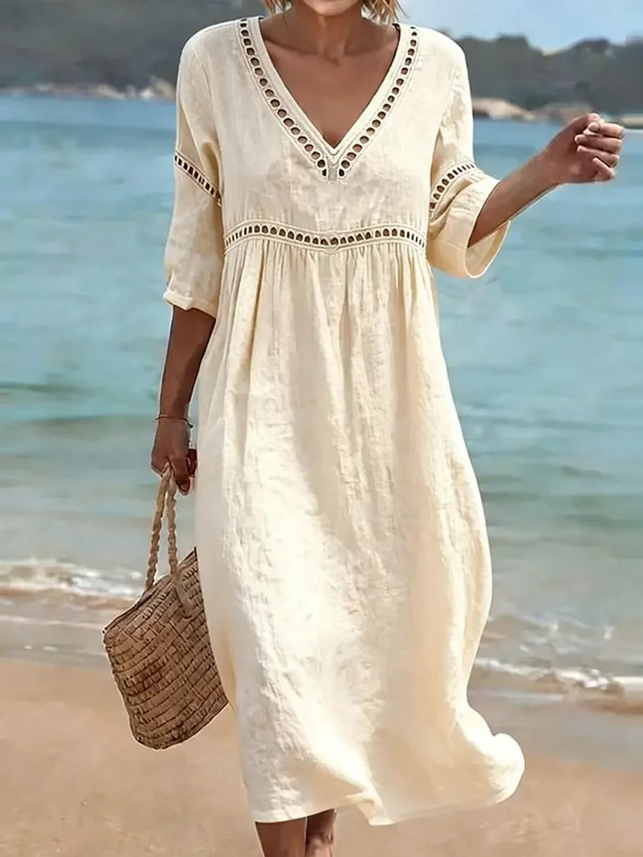 Vestido de mulher em algodão, liso, elegante e casual, para o verão, num estilo retro.